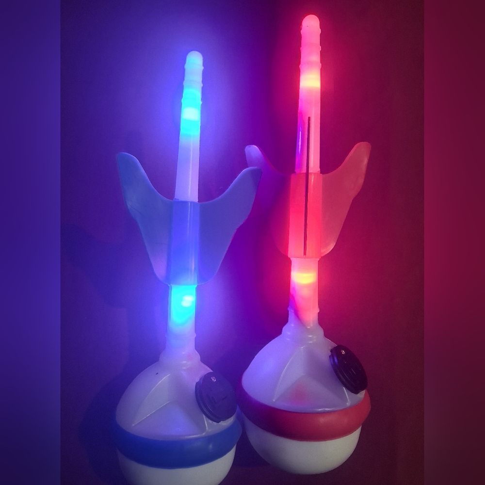 2 Light-Up Toy Lawn Darts with Blue and Red Glow